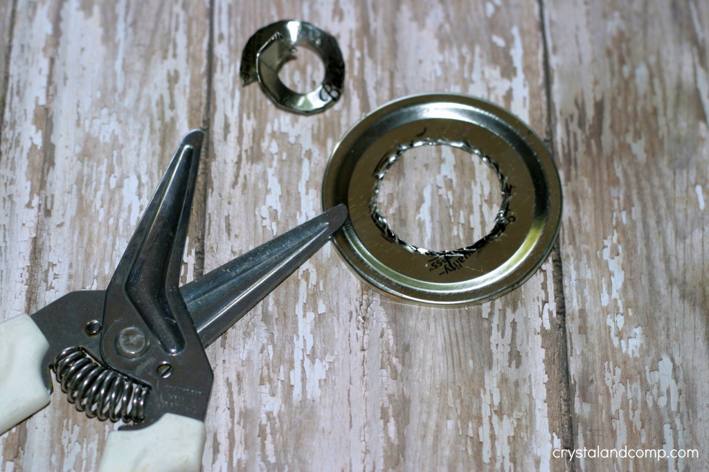 use heavy duty kitchen scissors to cut the rest of the mason jar lid