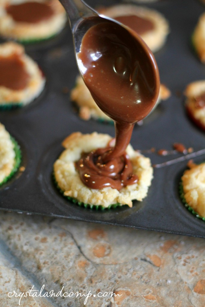 drizzle the melted rolos candy over the sugar cookie bites