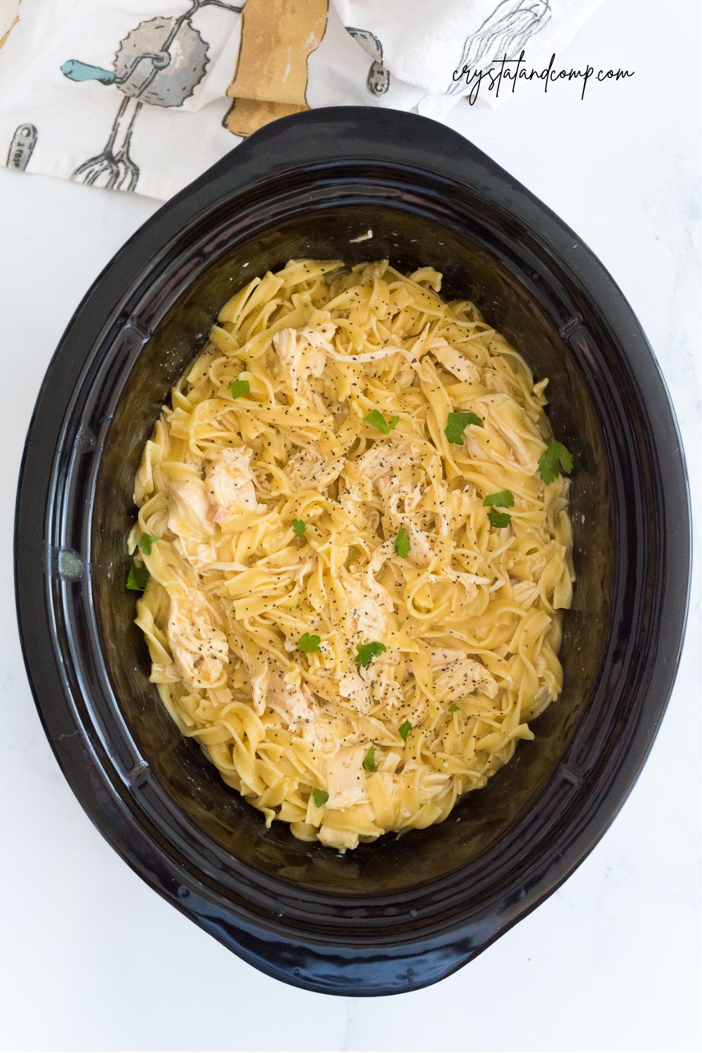 crockpot chicken and noodles in cooker