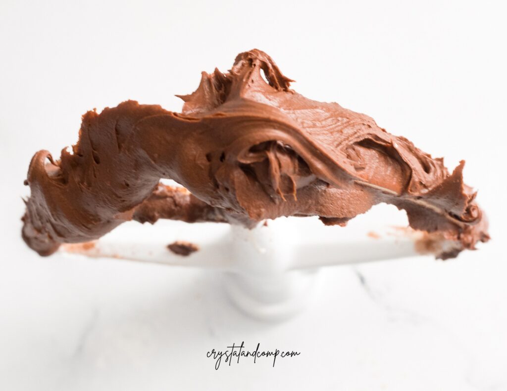 chocolate buttercream icing batter on mixing blade