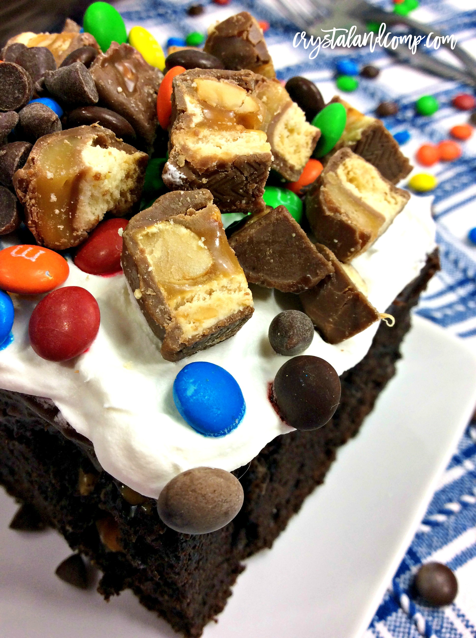 Fudge and Peanut Butter Candy Poke Cake