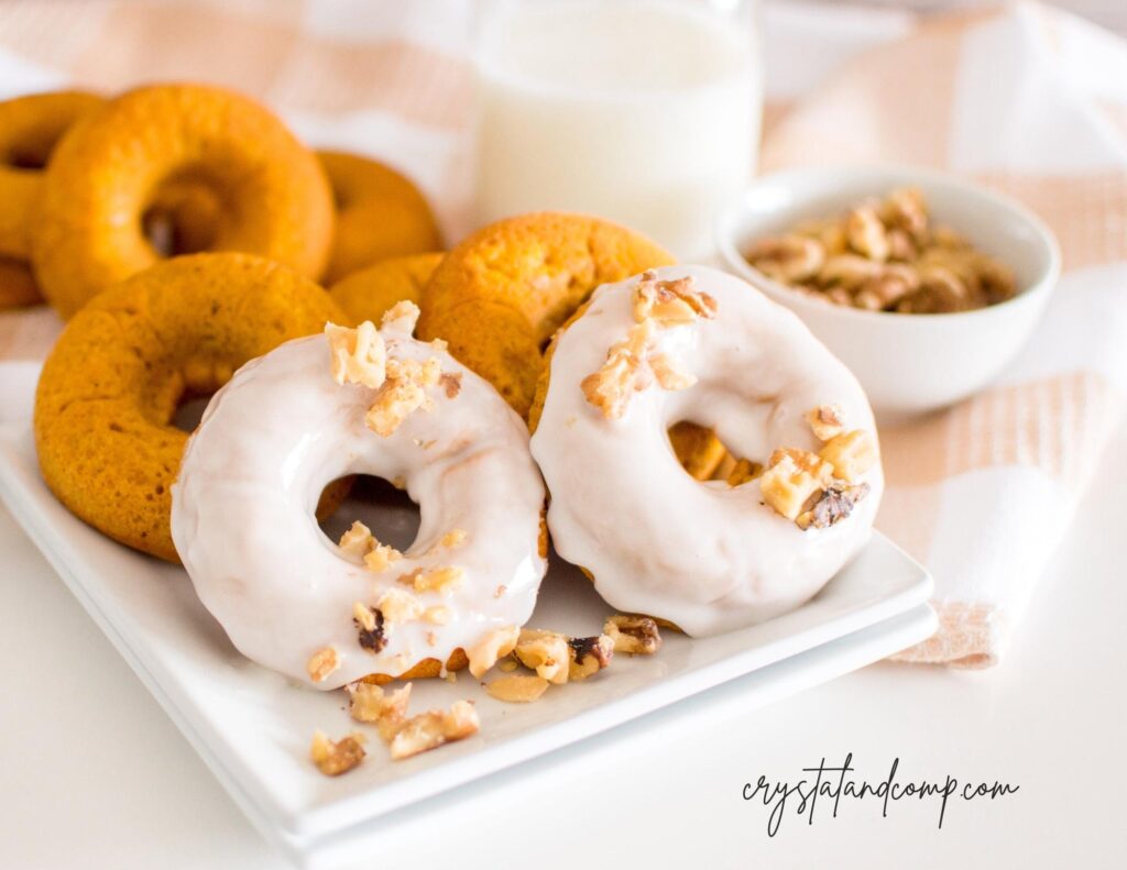 baked pumpkin donuts closeup on plate