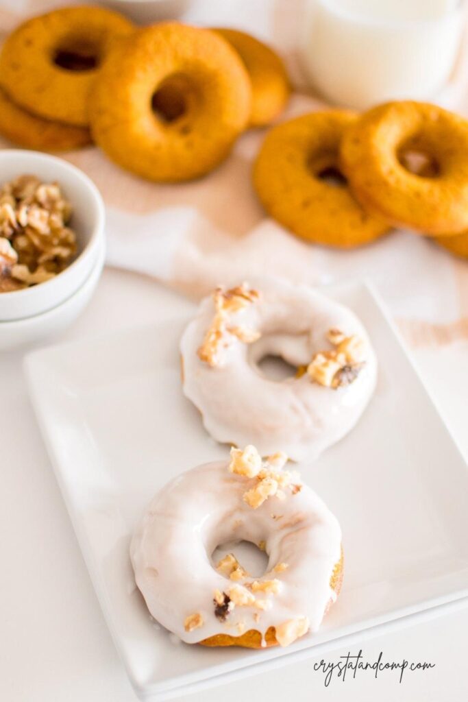 baked pumpkin donuts on plate overhead