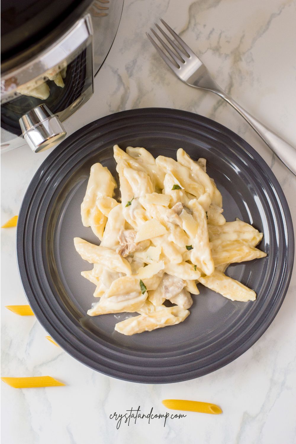 instant pot chicken pasta on gray plate