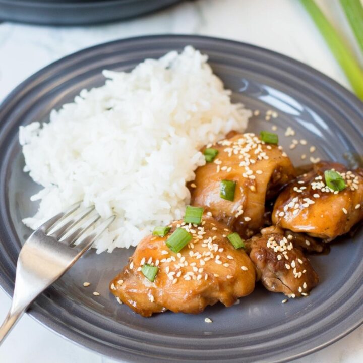 instant pot sesame chicken with fork on plate