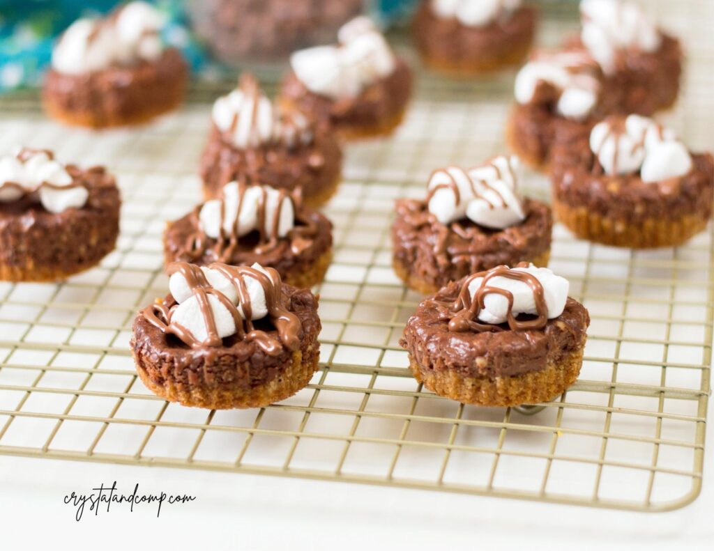 smores cheesecakes on cooling rack
