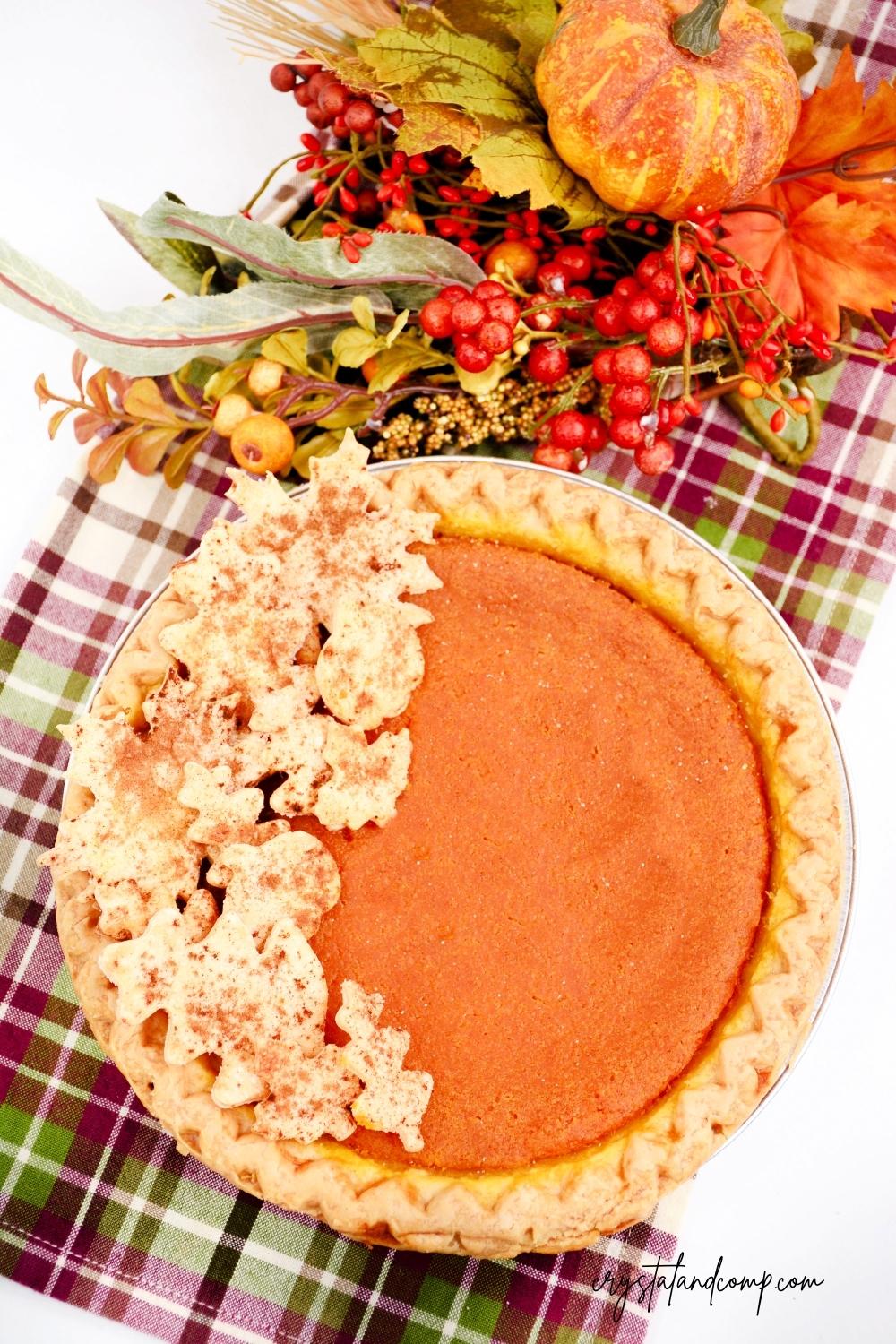 pumpkin pie recipe with leaves and berries
