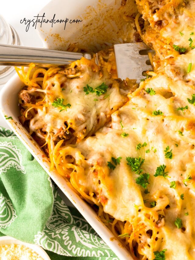 spaghetti casserole in pan with spatula