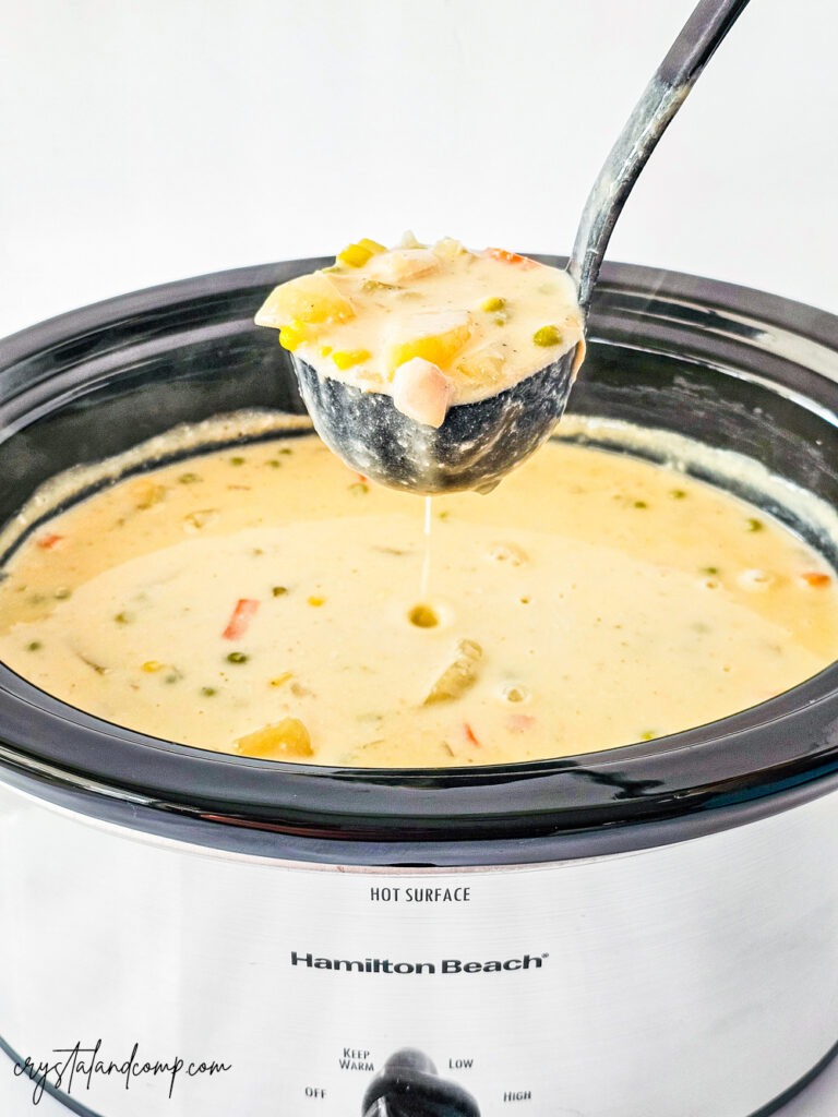 crockpot chicken pot pie soup in ladle